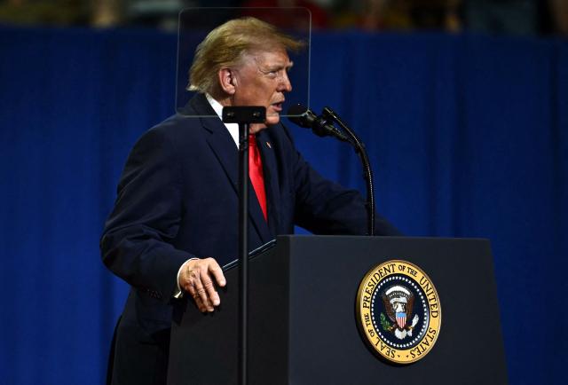 US President Donald Trump speaks during a campaign rally at the Covelli Centre in Youngstown, Ohio, on October 12, 2026. (Photo by Kent NISHIMURA / AFP)