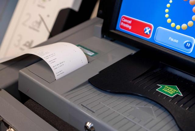 A close up of a voting machine as volunteers attend voter machine training ahead of the midterm elections, in Charlotte, North Carolina, on October 12, 2026. Americans voting in the November 3 midterm elections will decide who controls Congress for the final two years of Donald Trump's presidency, along with dozens of governorships and thousands of state offices. (Photo by Amy Stewart / AFP)