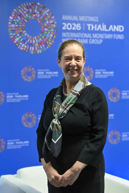 International Monetary Fund (IMF) deputy director of research Petya Koeva Brooks poses for a photograph alongside a media interview during the 2026 IMF-World Bank Group Annual Meetings at the Queen Sirikit National Convention Center (QSNCC) in Bangkok on October 12, 2026. The International Monetary Fund warned on October 13 that while low-income developing countries were dealing with the disproportionate impacts of the Iran war-fuelled energy shock, many had "no choice" but to cut spending or face debt restructuring. (Photo by Panumas Sanguanwong / AFP)
