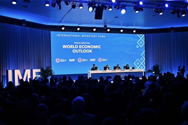 CORRECTION / (L-R) IMF Communications Officer Jose Luis De Haro, IMF Chief Economist Silvana Tenreyro, IMF Research Department Deputy Director Petya Koeva Brooks and IMF Research Department Division Chief Deniz Igan attend the World Economic Outlook press briefing at the Annual Meetings of the International Monetary Fund (IMF) and the World Bank Group (WBG) at the Queen Sirikit National Convention Center (QSNCC) in Bangkok on October 13, 2026. (Photo by Lillian SUWANRUMPHA / AFP) / The erroneous mention[s] appearing in the metadata of this photo by Lillian SUWANRUMPHA has been modified in AFP systems in the following manner: [October 13, 2026.] instead of [September 13, 2026.]. Please immediately remove the erroneous mention[s] from all your online services and delete it (them) from your servers. If you have been authorized by AFP to distribute it (them) to third parties, please ensure that the same actions are carried out by them. Failure to promptly comply with these instructions will entail liability on your part for any continued or post notification usage. Therefore we thank you very much for all your attention and prompt action. We are sorry for the inconvenience this notification may cause and remain at your disposal for any further information you may require.
