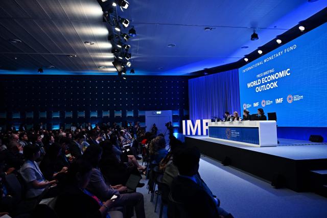 CORRECTION / (L-R) IMF Communications Officer Jose Luis De Haro, IMF Chief Economist Silvana Tenreyro, IMF Research Department Deputy Director Petya Koeva Brooks and IMF Research Department Division Chief Deniz Igan attend the World Economic Outlook press briefing at the Annual Meetings of the International Monetary Fund (IMF) and the World Bank Group (WBG) at the Queen Sirikit National Convention Center (QSNCC) in Bangkok on October 13, 2026. (Photo by Lillian SUWANRUMPHA / AFP) / The erroneous mention[s] appearing in the metadata of this photo by Lillian SUWANRUMPHA has been modified in AFP systems in the following manner: [October 13, 2026.] instead of [September 13, 2026.]. Please immediately remove the erroneous mention[s] from all your online services and delete it (them) from your servers. If you have been authorized by AFP to distribute it (them) to third parties, please ensure that the same actions are carried out by them. Failure to promptly comply with these instructions will entail liability on your part for any continued or post notification usage. Therefore we thank you very much for all your attention and prompt action. We are sorry for the inconvenience this notification may cause and remain at your disposal for any further information you may require.