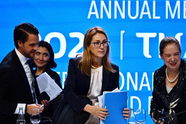 (L-R) IMF Communications Officer Jose Luis De Haro, IMF Research Department Division Chief Deniz Igan, IMF Chief Economist Silvana Tenreyro and IMF Research Department Deputy Director Petya Koeva Brooks leave the World Economic Outlook press briefing at the Annual Meetings of the International Monetary Fund (IMF) and the World Bank Group (WBG) at the Queen Sirikit National Convention Center (QSNCC) in Bangkok on October 13, 2026. (Photo by Lillian SUWANRUMPHA / AFP)