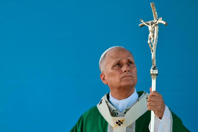 (FILES) Pope Leo XIV leads a mass in the port of Rimini during a pastoral visit on August 22, 2026. Pope Leo XIV will be admitted to hospital on October 13, 2026 for an operation to remove a lump from his lung, the Vatican said. The 71-year-old Leo announced on October 11, 2026 after his weekly prayers that he would undergo an operation "in the coming days". (Photo by Stefano RELLANDINI / AFP)