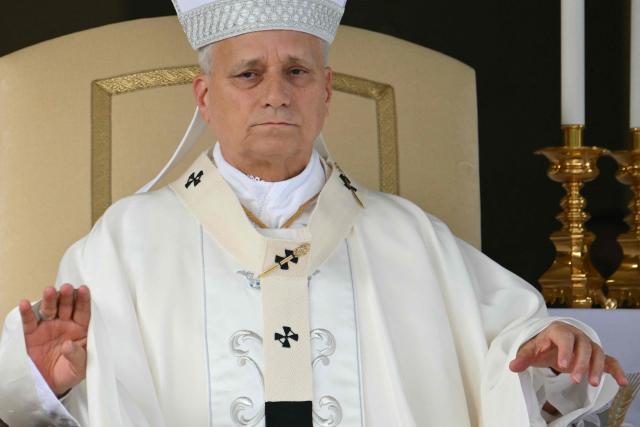 (FILES) Pope Leo XIV leads a mass at the Church of Maria Santissima del Lago for the Feast of Our Lady of the lake in Castel Gandolfo on August 29, 2026. Pope Leo XIV will be admitted to hospital on October 13, 2026 for an operation to remove a lump from his lung, the Vatican said. The 71-year-old Leo announced on October 11, 2026 after his weekly prayers that he would undergo an operation "in the coming days". (Photo by Alberto PIZZOLI / AFP)