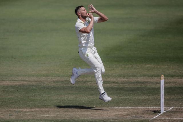Australia's Josh Hazlewood delivers a ball on day five of the first Test match between South Africa and Australia at the Kingsmead stadium in Durban on October 13, 2026. (Photo by Marco Longari / AFP)