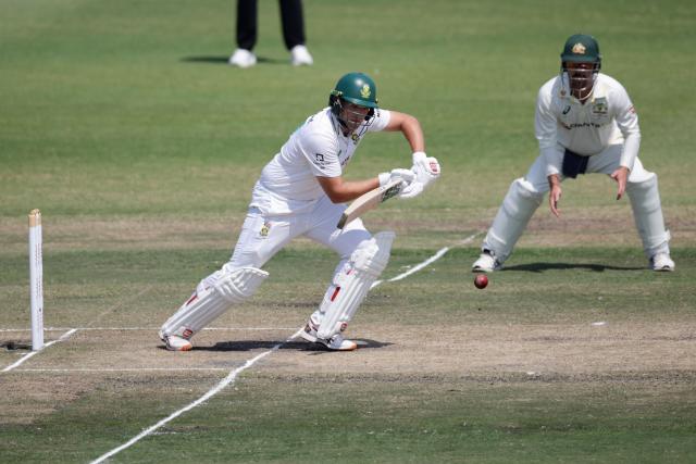 South Africa's Wiaan Mulder plays a shot on day five of the first Test match between South Africa and Australia at the Kingsmead stadium in Durban on October 13, 2026. (Photo by Marco Longari / AFP)