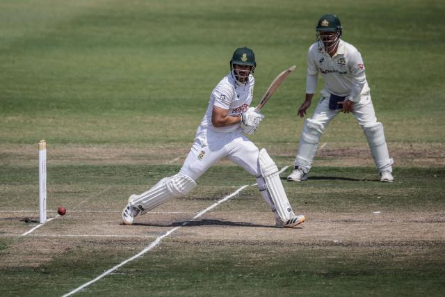 South Africa's Aiden Markram watches the ball after playing a shot on day five of the first Test match between South Africa and Australia at the Kingsmead stadium in Durban on October 13, 2026. (Photo by Marco Longari / AFP)