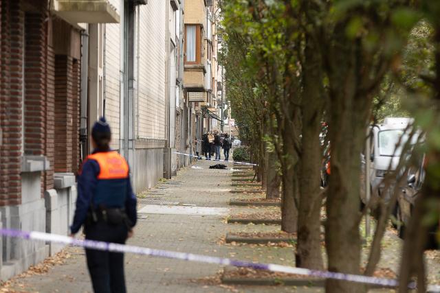 Belgian police work at the site of a shooting which took place in the night in Jette, Brussels on October 13, 2026. A police officer died overnight in Brussels following an exchange of gunfire during an operation to intercept a vehicle reported as stolen, according to initial reports from Belgian media. (Photo by JAMES ARTHUR GEKIERE / Belga / AFP) / Belgium OUT