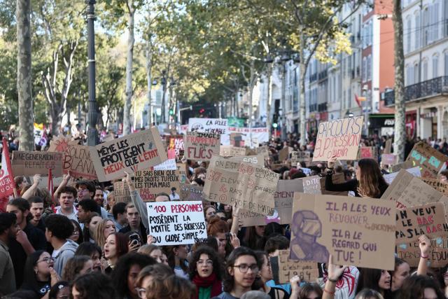 Protesters hold placards and banners during a demonstration of high-school students in Marseille, southern France on October 13, 2026, as part of a nationwide high school mobilisation. France sees nationwide demonstrations on October 13 in support of students protesting poor classroom conditions for weeks, as authorities and participants remain wary of further violence. (Photo by Thibaud MORITZ / AFP)