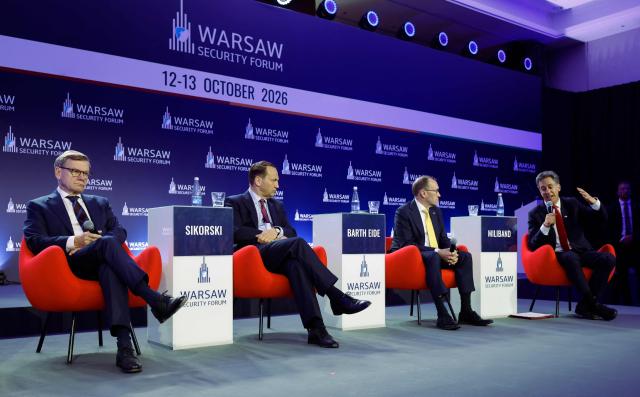 (L-R) German Foreign Minister Johann Wadephul, Polish Foreign Minister Radoslaw Sikorski, Norwegian Foreign Minister Espen Barth Eide and Britain's Foreign Secretary Ed Miliband attend a panel discussion during the Warsaw Security Forum in Warsaw, Poland on October 13, 2026. (Photo by Wojtek RADWANSKI / AFP)