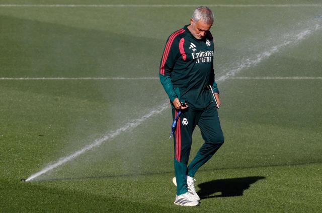 Real Madrid's Portuguese coach Jose Mourinho leads a training session at the Ciudad Real Madrid training ground in Madrid ahead of their UEFA Champions League football match against Roma, on October 13, 2026. (Photo by Oscar DEL POZO / AFP)