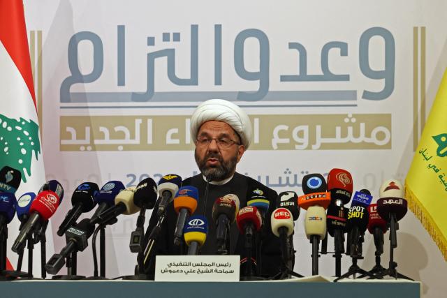 The head of Hezbollah's Executive Council, Ali Damoush addresses a press conference in the southern suburbs of Beirut on October 13, 2026. (Photo by Anwar AMRO / AFP)