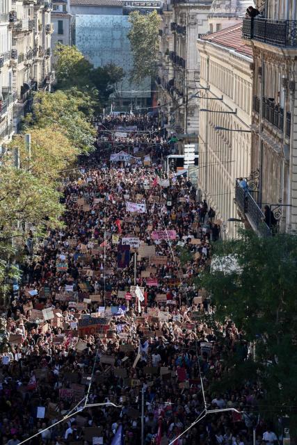 This photograph shows a general view of protesters holding placards while taking part in a demonstration  of high-school students in Marseille, southern France on October 13, 2026, as part of a nationwide high school mobilisation over learning conditions. France sees nationwide demonstrations on October 13 in support of students protesting poor classroom conditions for weeks, as authorities and participants remain wary of further violence. (Photo by Thibaud MORITZ / AFP)