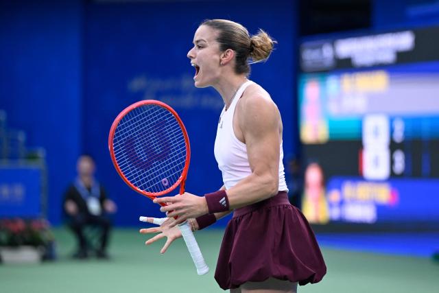 Greece's Maria Sakkari reacts during her women’s singles match against Ukraine's Marta Kostyuk at the Wuhan Open tennis tournament in Wuhan, China's Hubei province on October 13, 2026. (Photo by WANG Zhao / AFP)