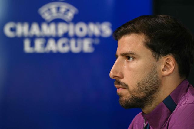 Manchester City's Portuguese defender #03 Ruben Dias attends a press conference at the Etihad Campus training ground in Manchester, north-west England, on October 13, 2026, on the eve of their UEFA Champions League, league phase football match against PSG. (Photo by Oli SCARFF / AFP)