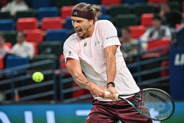 Germany's Alexander Zverev hits a return to Kazakhstan's Alexander Bublik during their men's singles match at the Shanghai Masters tennis tournament in Shanghai on October 13, 2026. (Photo by Hector RETAMAL / AFP)
