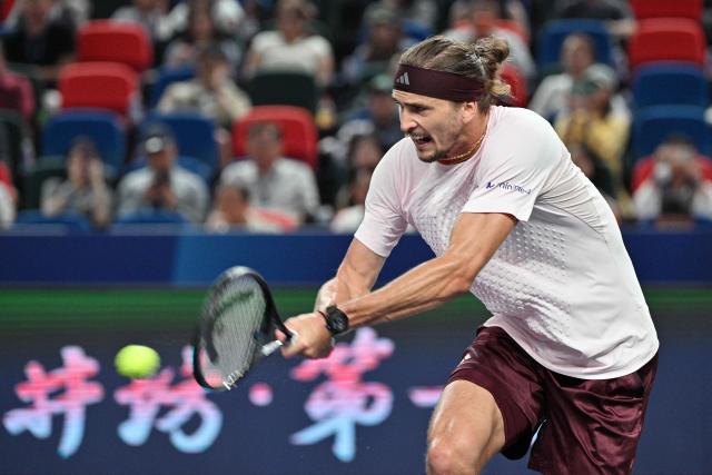 Germany's Alexander Zverev hits a return to Kazakhstan's Alexander Bublik during their men's singles match at the Shanghai Masters tennis tournament in Shanghai on October 13, 2026. (Photo by Hector RETAMAL / AFP)