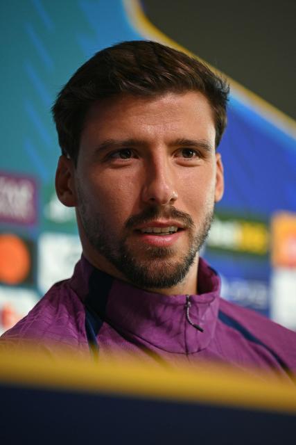 Manchester City's Portuguese defender #03 Ruben Dias attends a press conference at the Etihad Campus training ground in Manchester, north-west England, on October 13, 2026, on the eve of their UEFA Champions League, league phase football match against PSG. (Photo by Oli SCARFF / AFP)