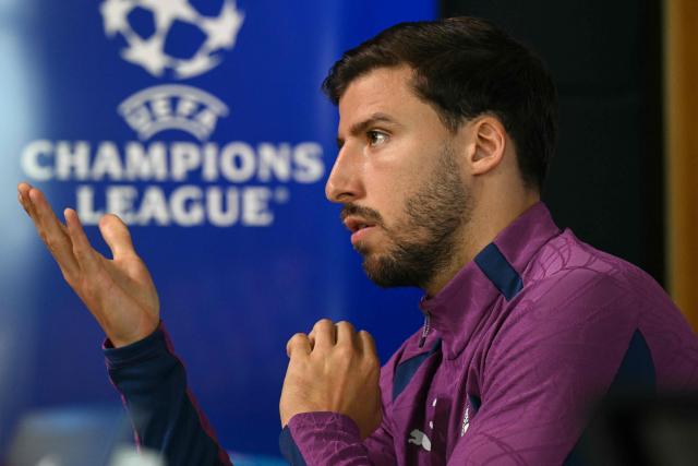 Manchester City's Portuguese defender #03 Ruben Dias attends a press conference at the Etihad Campus training ground in Manchester, north-west England, on October 13, 2026, on the eve of their UEFA Champions League, league phase football match against PSG. (Photo by Oli SCARFF / AFP)