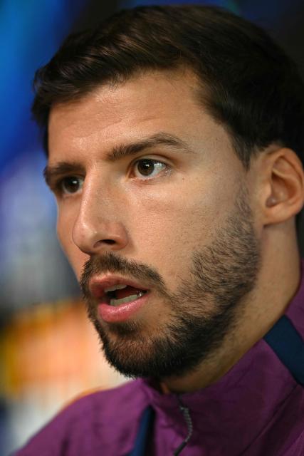 Manchester City's Portuguese defender #03 Ruben Dias attends a press conference at the Etihad Campus training ground in Manchester, north-west England, on October 13, 2026, on the eve of their UEFA Champions League, league phase football match against PSG. (Photo by Oli SCARFF / AFP)