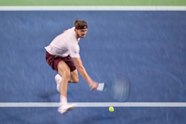 Germany's Alexander Zverev hits a return to Kazakhstan's Alexander Bublik during their men's singles match at the Shanghai Masters tennis tournament in Shanghai on October 13, 2026. (Photo by Hector RETAMAL / AFP)