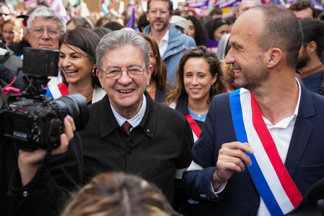Left-wing party La France Insoumise (LFI) candidate in France's 2027 presidential election Jean-Luc Melenchon (3rd L) reacts flanked by La France Insoumise - Nouveau Front Populaire's MP and National Assembly vice-president Clemence Guette (2nd R) La France Insoumise - Nouveau Front Populaire's MP Manuel Bompard (R) during a demonstration of high-school students in Paris, on October 13, 2026, as part of a nationwide high school mobilisation. France sees nationwide demonstrations on October 13 in support of students protesting poor classroom conditions for weeks, as authorities and participants remain wary of further violence. (Photo by Dimitar DILKOFF / AFP)