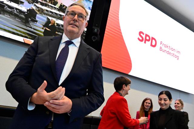 Former Rhineland-Palatinate state premier and designated German Minister for Labour and Social Affairs Alexander Schweitzer takes his seat as he arrives to attend a meeting with the parliamentary group of their social democratic SPD party in Berlin, on October 13, 2026. Schweitzer will replace Baerbel Bas as German Minister for Labour and Social Affairs, after she unexpectedly quit. Bas cited personal reasons for her resignation, saying she needed time to grieve following the death of her daughter-in-law. (Photo by John MACDOUGALL / AFP)