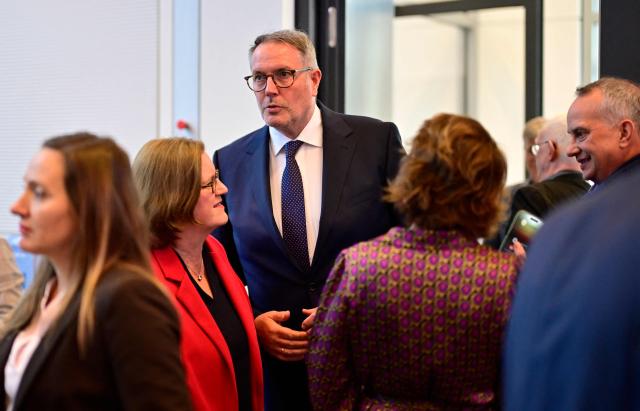 Former Rhineland-Palatinate state premier and designated German Minister for Labour and Social Affairs Alexander Schweitzer (C) arrives to attend a meeting with the parliamentary group of their social democratic SPD party in Berlin, on October 13, 2026. Schweitzer will replace Baerbel Bas as German Minister for Labour and Social Affairs, after she unexpectedly quit. Bas cited personal reasons for her resignation, saying she needed time to grieve following the death of her daughter-in-law. (Photo by John MACDOUGALL / AFP)