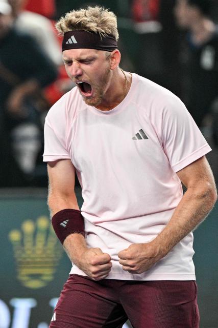 Spain's Alejandro Davidovich Fokina celebrates his victory against Poland's Hubert Hurkacz during their men's singles match at the Shanghai Masters tennis tournament in Shanghai on October 13, 2026. (Photo by Hector RETAMAL / AFP)