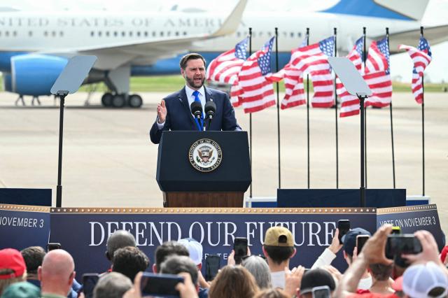 US Vice President JD Vance speaks during a campaign rally at Tyler Pounds Regional Airport  in Tyler, Texas, on October 13, 2026. Vance is campaigning for several Republican candidates on the November midterm ballot. (Photo by SAUL LOEB / POOL / AFP)