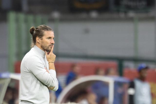 Lens' head coach Yannick Cahuzac looks on from the sidelines during the UEFA Champions League, league phase matchday 2, football match between RC Lens and Sporting CP at the Stade Bollaert-Delelis in Lens, northern France, on October 13, 2026. (Photo by Francois LO PRESTI / AFP)