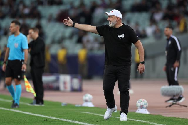 Slavia Prague's Czech coach Jindrich Trpisovsky reacts during the UEFA Champions League match between Sabah and Slavia Praha at the Baku Olympic Stadium in Baku on October 13, 2026. (Photo by Giorgi ARJEVANIDZE / AFP)