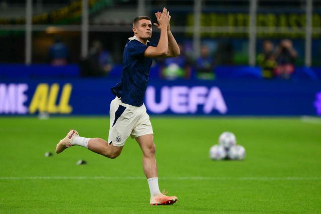 Club Brugge's German forward #07 Nicolo Tresoldi warms up before the UEFA Champions League first round day 2 football match between Inter Milan and Club Brugge at San Siro stadium in Milan, on October 13, 2026 (Photo by Marco BERTORELLO / AFP)