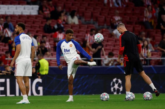 Manchester United's Ivorian forward #16 Amad Diallo warms up prior the UEFA Champions League, league phase, matchday 2,  football match between Club Atletico de Madrid and Manchester United at the Metropolitano stadium in Madrid on October 13, 2026. (Photo by Oscar DEL POZO / AFP)