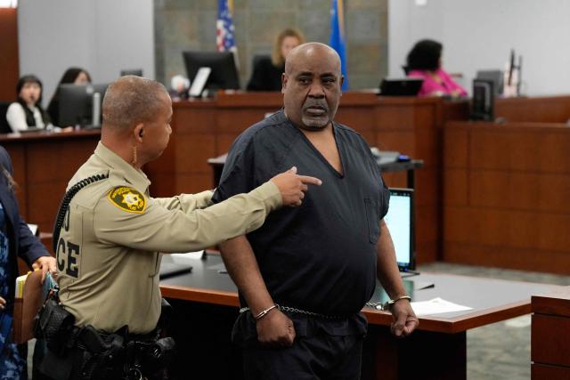 Duane Davis (C) arrives for his sentencing hearing in the 1996 killing of rapper Tupac Shakur, at Clark County District Court at the Regional Justice Center in Las Vegas, Nevada, on October 13, 2026. Davis, a former Los Angeles gang member, will be sentenced today after being found guilty on August 31, 2026 by a Las Vegas court, thirty years after the rap legend's death in Las Vegas. (Photo by John Locher / POOL / AFP)