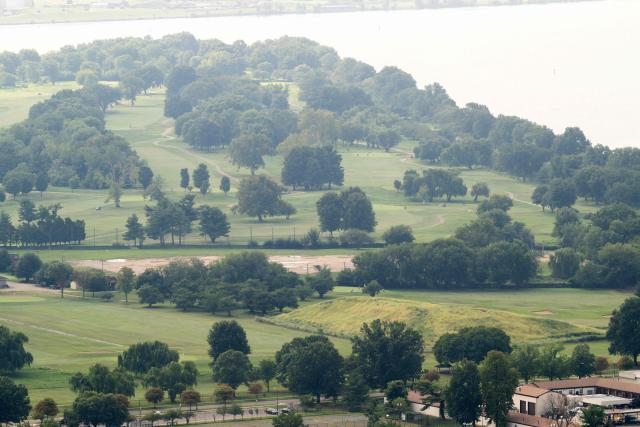 (FILES) Hains Point and the East Potomac Golf Links, including a mound of debris from the White House's East Wing project, is seen in Washington, DC, September 1, 2026. A US federal judge on October 13, 2026, extended a halt on tree-cutting at a Washington golf course at East Potomac Park until October 26, pausing work at the historic site that is part of President Donald Trump's plan to remake the capital. Judge Ana Reyes issued an emergency order on Monday halting further tree removal, in a victory for environmental advocates, who estimated that about 500 trees were felled at the site over the weekend and hundreds more were slated to be cut down later in the week. (Photo by SAUL LOEB / AFP)