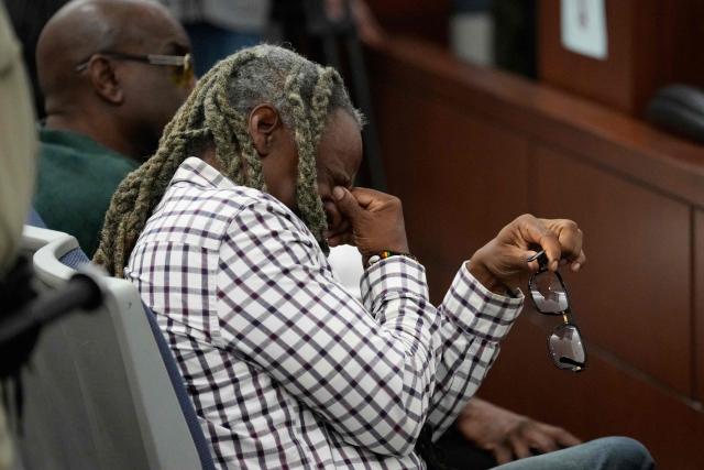 A man reacts during a sentencing hearing for Duane Davis after Davis’ murder conviction in the 1996 killing of rapper Tupac Shakur, at Clark County District Court at the Regional Justice Center in Las Vegas, Nevada, on October 13, 2026. Davis, a former Los Angeles gang member, will be sentenced today after being found guilty on August 31, 2026 by a Las Vegas court, thirty years after the rap legend's death in Las Vegas. (Photo by John Locher / POOL / AFP)