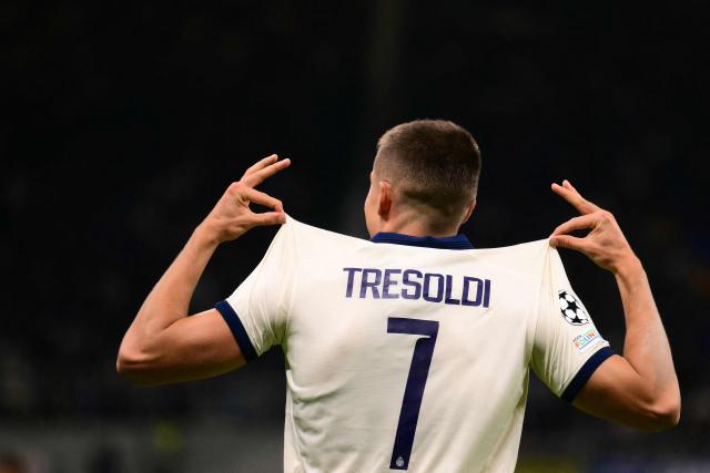 Club Brugge's German forward #07 Nicolo Tresoldi celebrates scoring his team's second goal with teammates during the UEFA Champions League first round day 2 football match between Inter Milan and Club Brugge at San Siro stadium in Milan, on October 13, 2026 (Photo by Marco BERTORELLO / AFP)
