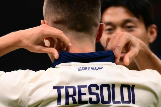 Club Brugge's German forward #07 Nicolo Tresoldi celebrates scoring his team's second goal with teammates during the UEFA Champions League first round day 2 football match between Inter Milan and Club Brugge at San Siro stadium in Milan, on October 13, 2026 (Photo by Marco BERTORELLO / AFP)