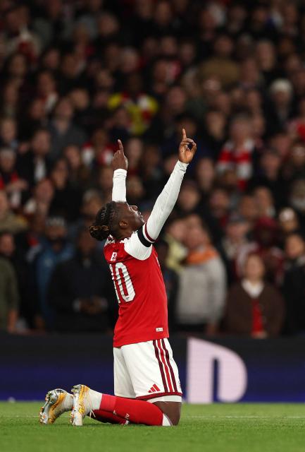 Arsenal's English midfielder #10 Eberechi Eze celebrates scoring the team's second goal during the UEFA Champions League, league phase football match between Arsenal and Lille at the Emirates Stadium in north London on October 13, 2026. (Photo by Adrian Dennis / AFP)