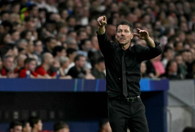 Atletico Madrid's Argentine coach Diego Simeone gestures on the touchline during the UEFA Champions League, league phase, matchday 2,  football match between Club Atletico de Madrid and Manchester United at the Metropolitano stadium in Madrid on October 13, 2026. (Photo by Javier SORIANO / AFP)