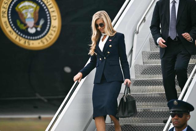 White House Press Secretary Katie Zacharia disembarks Air Force One at Elmendorf Air Force Base in Anchorage, Alaska, on October 13, 2026. President Trump is traveling to Wasilla, Alaska to hold a campaign rally ahead of the midterm elections. (Photo by Kent NISHIMURA / AFP)
