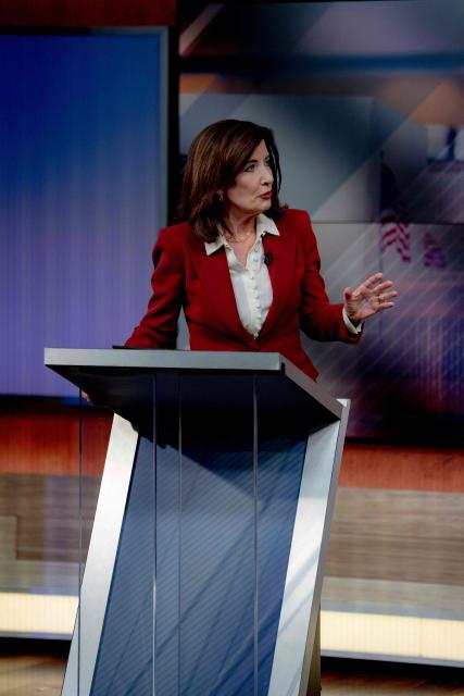 New York Governor Kathy Hochul speaks during a debate against Republican candidate Bruce Blakeman in a televised debate at the Spectrum News NY1 studios in New York on October 13, 2026. (Photo by Anna CONNORS / POOL / AFP)