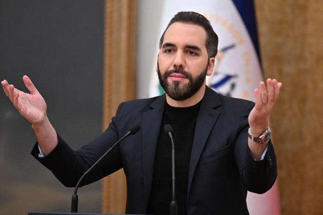 El Salvador's President Nayib Bukele gestures during a press conference following announcements on Spanish investment and economic cooperation in the country at the Presidential House in San Salvador on October 13, 2026. (Photo by MARVIN RECINOS / AFP)