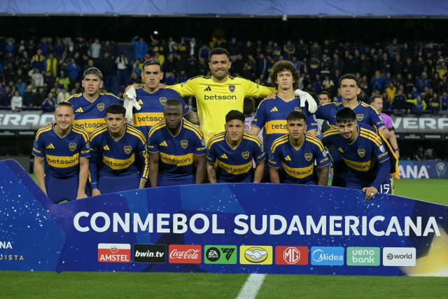 Boca Juniors players pose for a team photo ahead of the Copa Sudamericana semifinal first leg football match between Argentina's Boca Juniors and Brazil's Vasco da Gama at the Bombonera stadium in Buenos Aires on October 13, 2026. (Photo by JUAN MABROMATA / AFP)