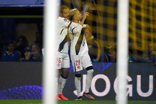 Vasco da Gama's midfielder #28 Adson celebrates with teammate defender #96 Paulo Henrique after scoring his team's first goal during the Copa Sudamericana semifinal first leg football match between Argentina's Boca Juniors and Brazil's Vasco da Gama at the Bombonera stadium in Buenos Aires on October 13, 2026. (Photo by JUAN MABROMATA / AFP)