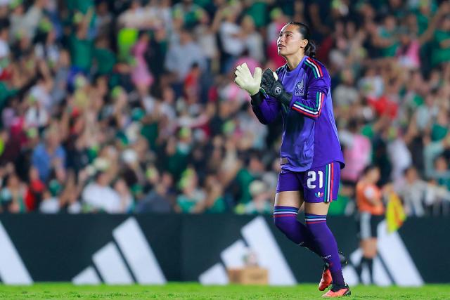 Mexico's goalkeeper #21 Stephany Barrera celebrate scored by Mexico's forward #11 Lizbeth Ovalle (out of frame) during the women's international friendly football match between Mexico and Jamaica at La Corregidora Stadium in Santiago de Queretaro, Queretaro State, Mexico on October 13, 2026. (Photo by Cesar Gomez / AFP)