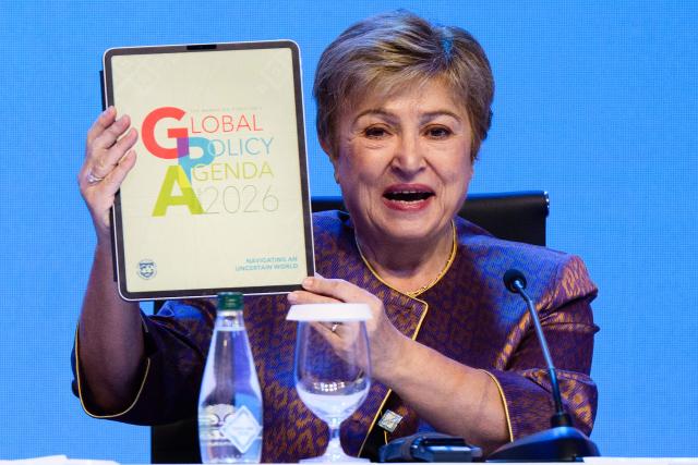 IMF Managing Director Kristalina Georgieva holds a tablet device during the Managing Director briefing on the Global Policy Agenda during the 2026 IMF-World Bank Group Annual Meetings at the Queen Sirikit National Convention Center (QSNCC) in Bangkok on October 14, 2026. (Photo by ANTHONY WALLACE / AFP)