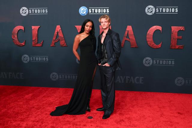 English actress Naomi Ackie and Welsh actor Tom Rhys Harries attend the world premiere of Warner Bros. film "Clayface" at the Hollywood Legion Theater in Los Angeles, California, on October 13, 2026. (Photo by VALERIE MACON / AFP)