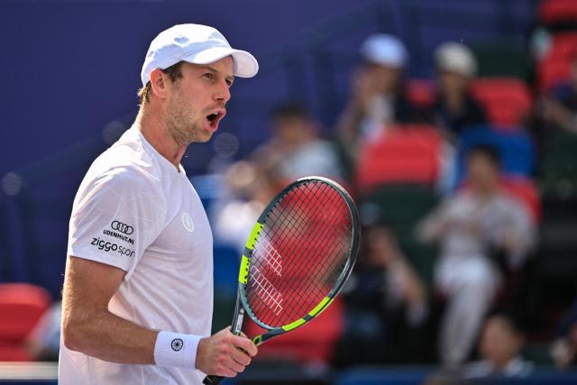 Netherlands's Botic van de Zandschulp reacts after a point against Spain's Rafael Jodar during their men's singles match at the Shanghai Masters tennis tournament in Shanghai on October 14, 2026. (Photo by Hector RETAMAL / AFP)
